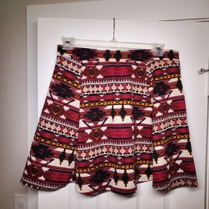 Tribal print pleated flared mini skirt